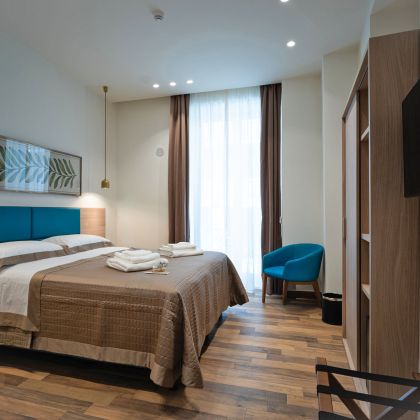 Elegante e storica suite con biancheria da letto